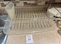 Overall view of dish rack with utensil cup and drip tray