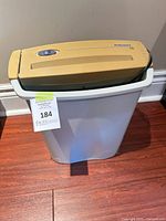 Full view of Fellowes FS5 shredder on white bin with tag 184