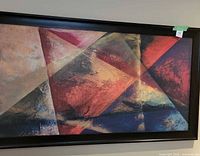 Full view of framed abstract canvas showing overall composition and frame