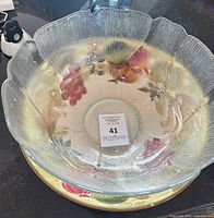 Top view of glass bowl nested on plate