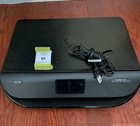 Top view of HP Envy 4522 printer with power cord