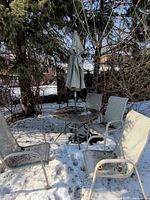 Full set outdoors: table, 4 chairs, umbrella
