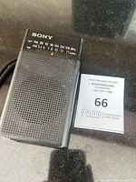 Front view showing Sony branding, tuning scale, speaker grille