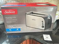 Box front showing brand, model and features