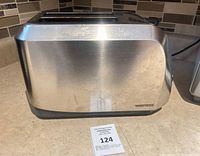 Left side of stainless steel Toastess two-slice toaster