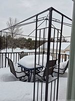Steel gazebo frame set up on deck