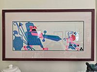 Full view of framed David & Goliath print in frame