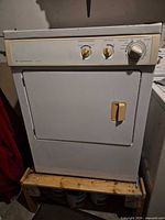 Front view showing entire Frigidaire dryer, control panel, door and handle