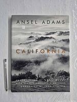 Front cover showing title, author, dust jacket and scale pen