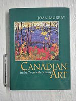 Front cover showing title, author, artwork, scale pen