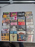 Full lot of CDs laid out in rows