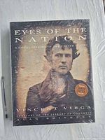 Front cover of shrinkwrapped book showing title and authors