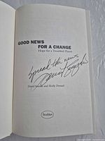 Signed title page showing inscription and signature