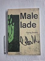 Front cover showing title, artist name, cover art and scale pen