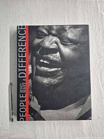 Front dust jacket with English title and cover portrait