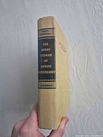 Spine view showing cloth binding, title, author, publisher