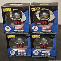 Front view of four boxed Marvel Dorbz Ant-Man figures