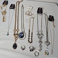Full layout of necklaces, earrings and rings