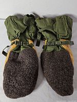 Front view of mitten pair showing wool pile fronts