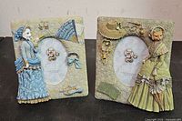Both Victorian style cat picture frames front view