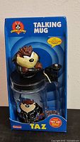 Front of sealed box showing Taz Talking Mug
