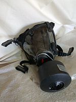 Front view of respirator with filter attached
