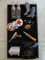 Overview of all assorted small items arranged in tray
