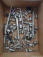 Overview of entire box showing quantity and variety of sockets and accessories
