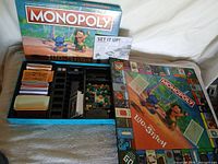 Box, opened tray and board displayed