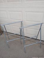 Both metal A-frame sign stands front view