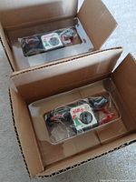 Both Kellogg’s cameras sealed in plastic inside cardboard boxes