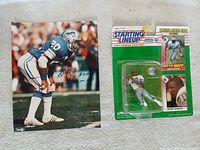 Lot overview showing signed photo and sealed Starting Lineup figure