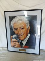 Full view of framed, signed Tony Bennett portrait