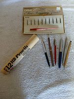 Overview of all items: mapping nib set, pencil tube, six pens