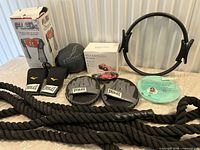 Overview shot of all items including battle rope, boxes, mitts and accessories