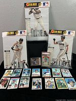 Overview of all items – 3 Giants stand-ups, graded card, sleeved card, 15 loose cards