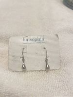 Front view of earrings on Lia Sophia card