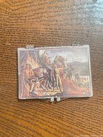 front view of clear snaplock case showing Sacagawea insert