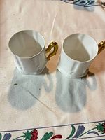 Top view of both cups showing interior and handle design