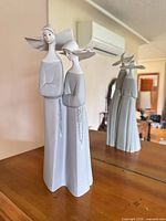 Front view of Lladro figurine showing two women and overall condition