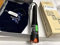 EMF tester box, visual fault locator, Swarovski beads in velvet bag inside open gift box