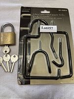 Front view of Ultra hook set card, padlock, four keys