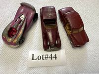 Top view of three die-cast cars