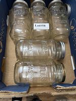 Six clear glass Atlas Mason jars with lids in box