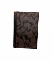 Front cover showing marbled boards and black spine