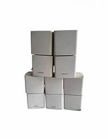 Front view of stacked dual-cube satellite speakers