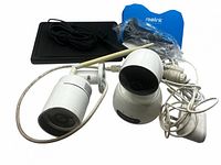 Bullet camera, dome camera, solar panel, cables visible