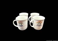 Four Sunrise Diner mugs angled front view
