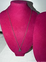 Full view of necklace on display bust