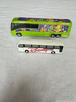 Top view of two Disney model buses